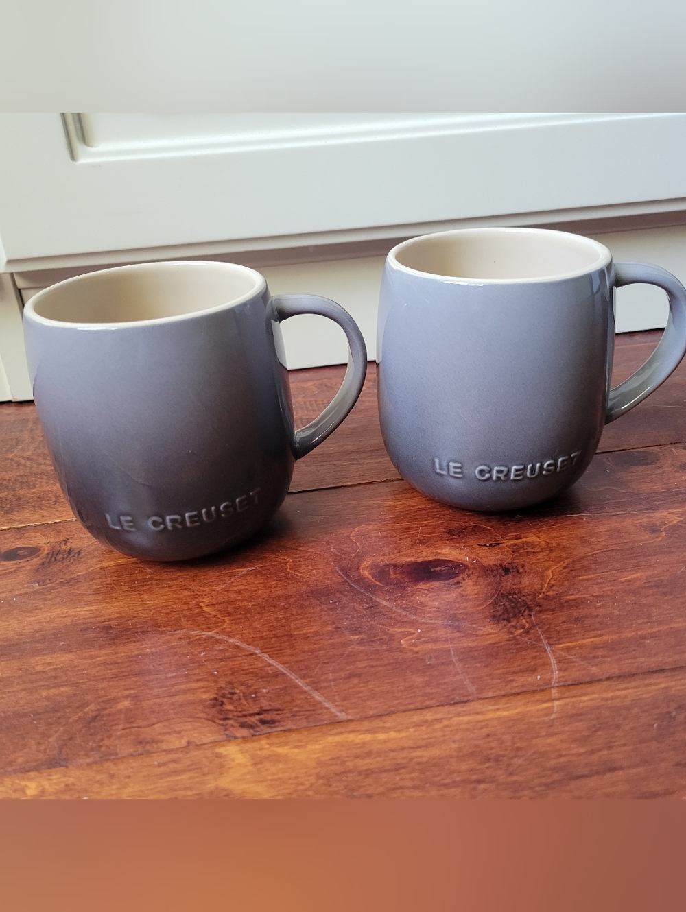 2 Le Creuset Stoneware Coupe Mug in the Flint color. 